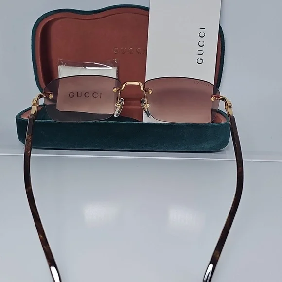 GUCCI UNISEX GG1221S 004 GUCCI RIMLESS GG LOGO ON LENS SUNGLASSES - Picture 5 of 13